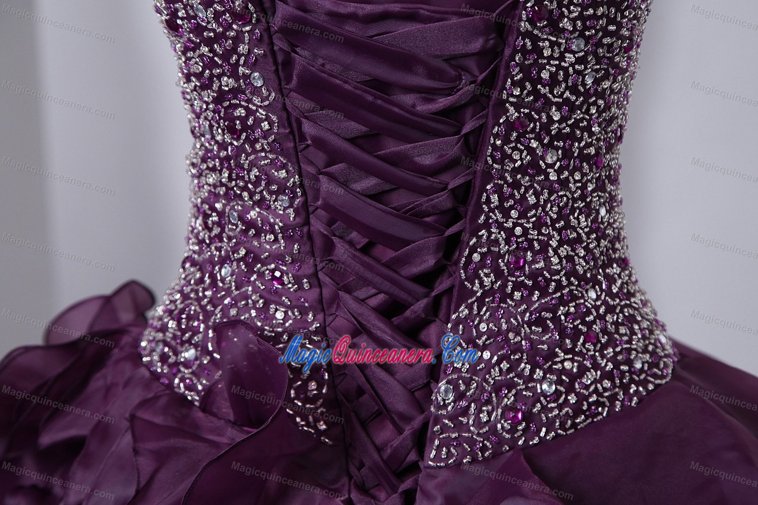 Dark Purple Sweetheart Beaded Dress for a Quinceanera Ruffled Layers