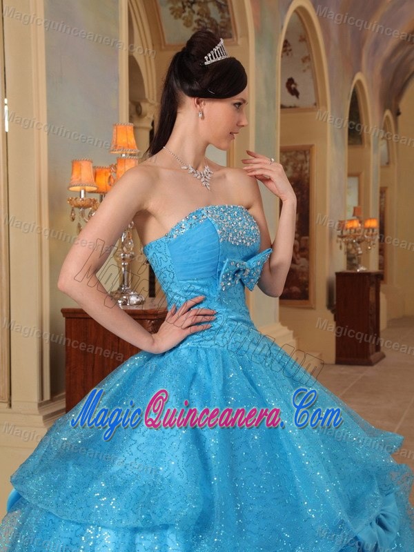 Blue Quinceanera Dress with Embroidery in Organza and Shinning Fabric