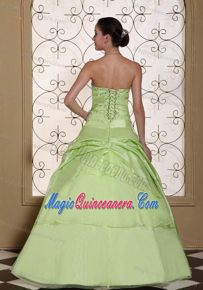 Sweetheart Yellow Green Sweet 15 Dress with Beading and a Hand Made Flower