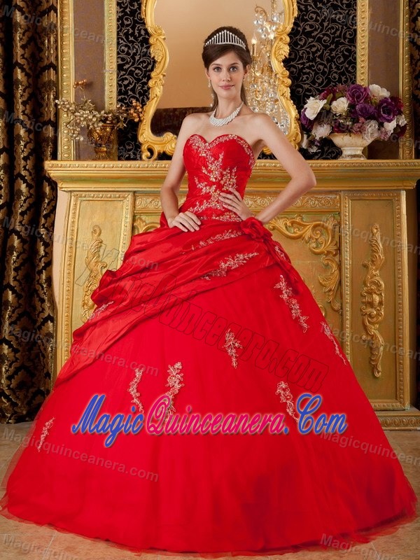 Red Quinceanera Dress with Appliques and Asymmetric Ruffled Layers