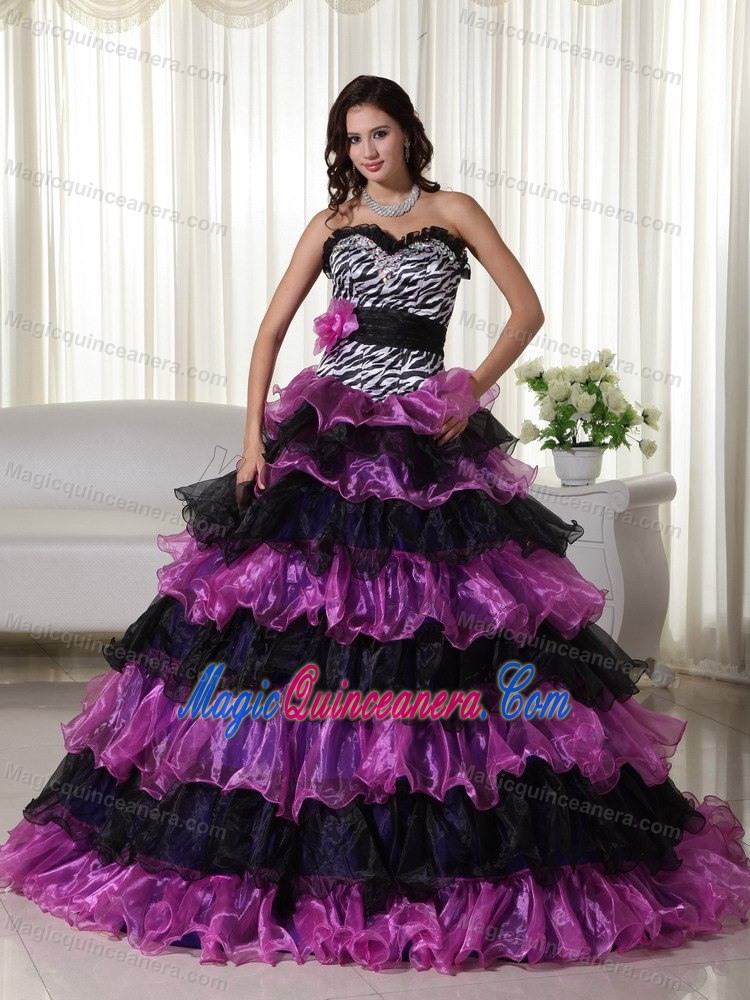 Zebra Printed Ruffled Quinceanera Dress with a Hand Made Flower Sash