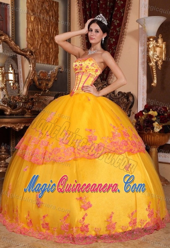 Gold Quinceanera Dress with Boning Details and red Lace Appliques