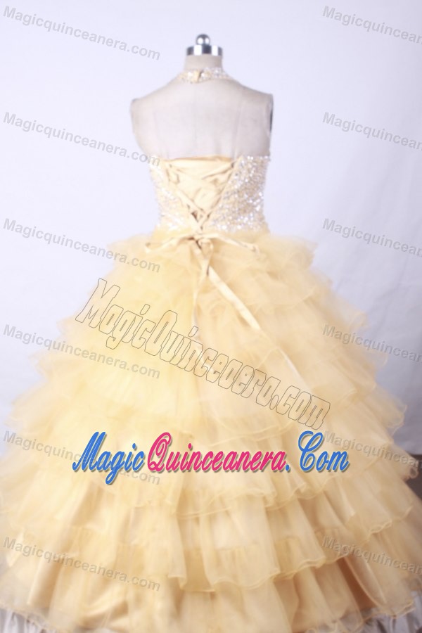 Gold Halter Little Girl Pageant Dress With Ruffled Layers and Beading