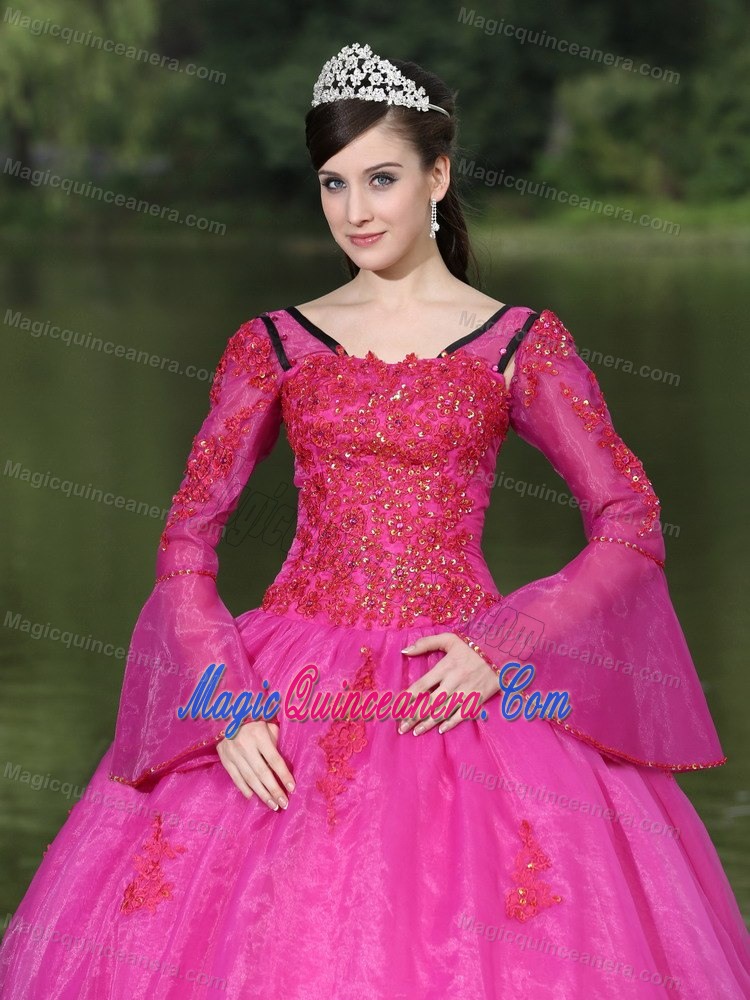 Fuchsia Long Sleeves Dresses for A Quinceanera with Tiers and Appliques