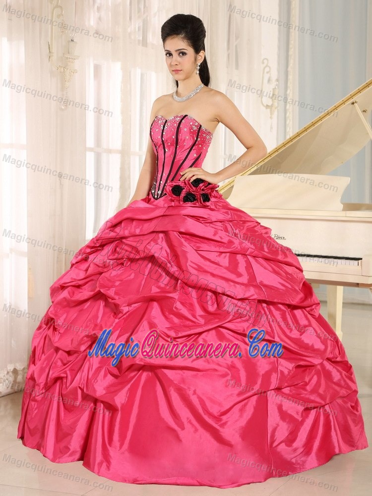 Beaded Flowers Pick Us Dresses for a Quinceanera in Hot Pink