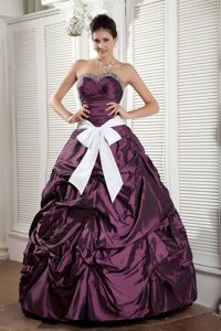 Beaded Sweetheart Dark Purple Quinceanera Dresses with Bow in Idaho